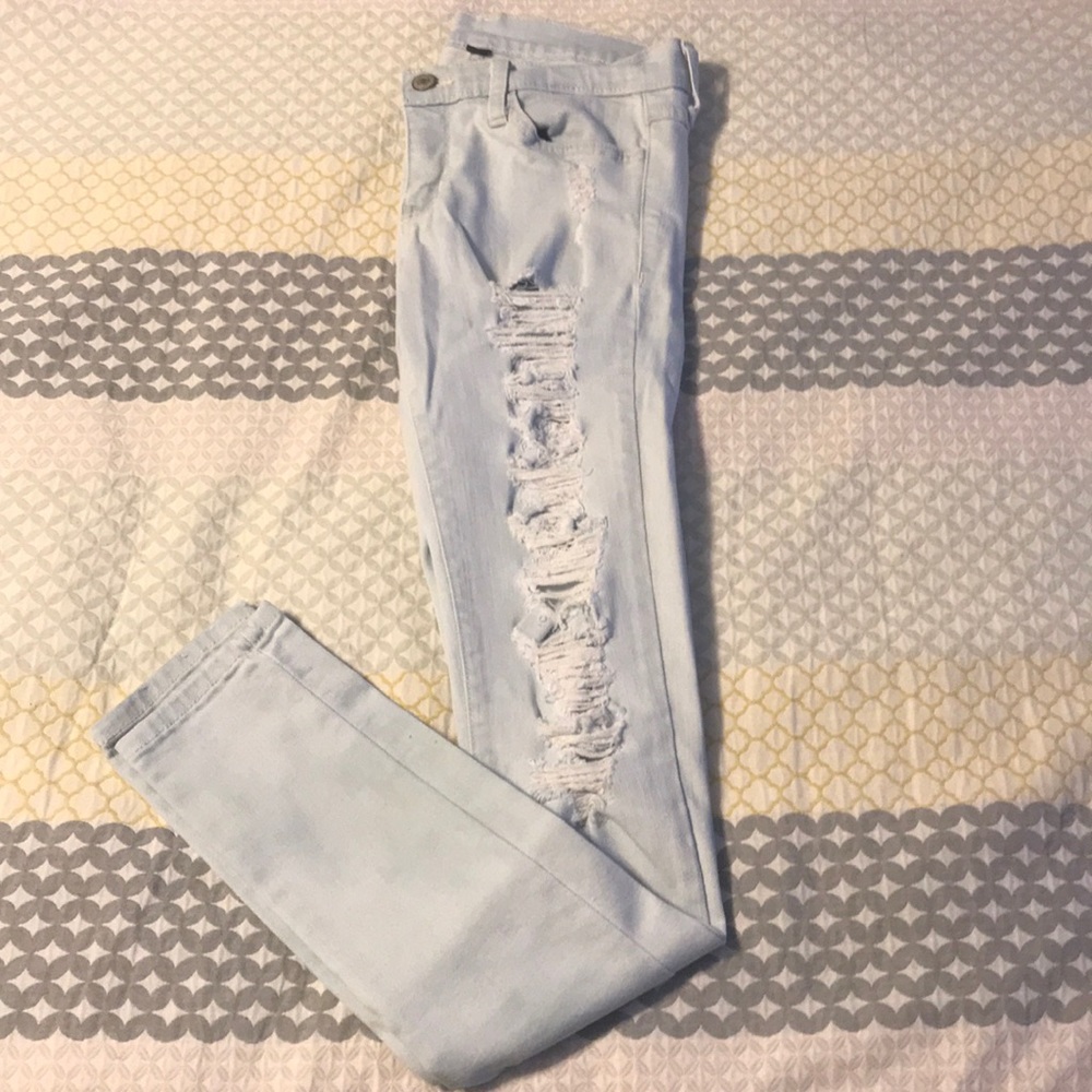 Light blue ripped jeans